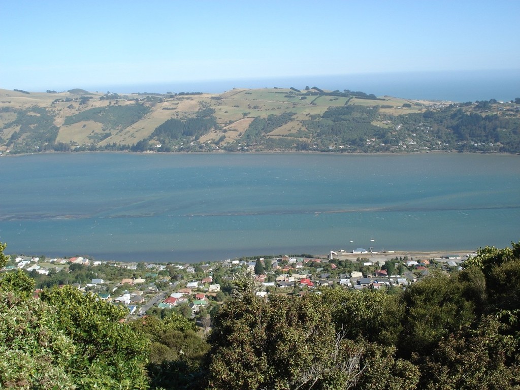 View showing the gap in Wall -a now submerged wall built by the early settlers and running part of the length of Otago Harbour to force a channel up the western side of the harbour for shipping into Dunedin. © Colin Preston